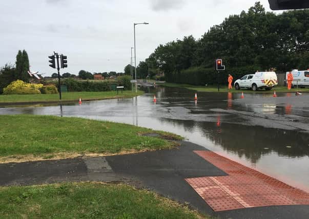 Flooding at the B1200 crossroads in Manby. Photo: Ian Butcher