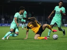 Wright jnr battles for the ball against Notts. Photo: Oliver Atkin