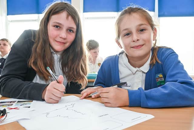 Isabella Holden and Evie Williamson take part in a geography lesson