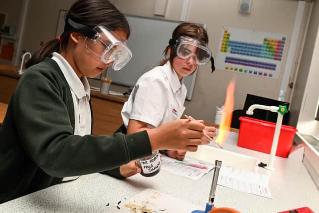 Brooke Dean and Willow Atkinson get to know how to use the Bunsen burners in science