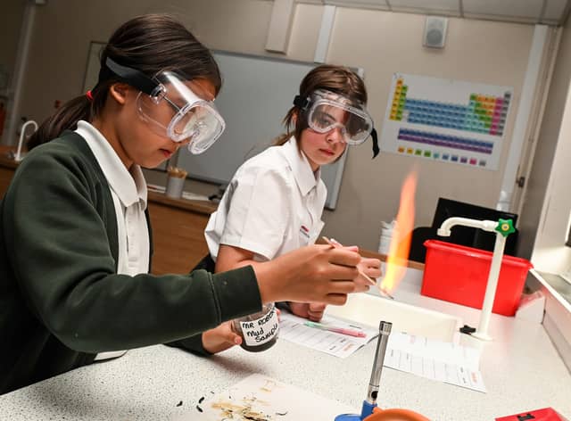 Brooke Dean and Willow Atkinson get to know how to use the Bunsen burners in science