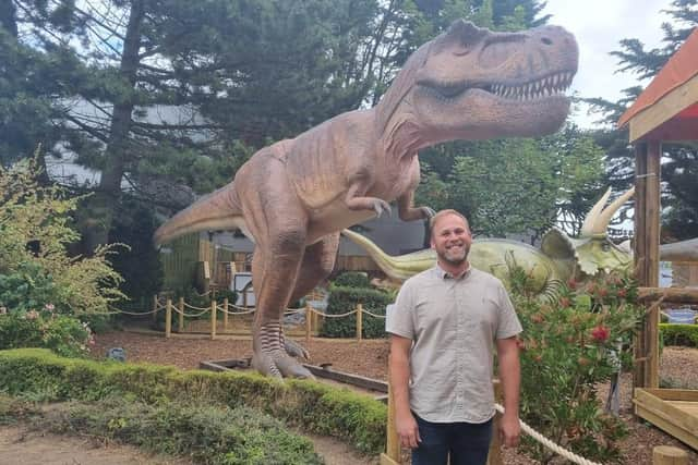 Charlton Cooper, director of Teen Spirit Ltd, in the new dinosaur experience at Skegness Aquarium.