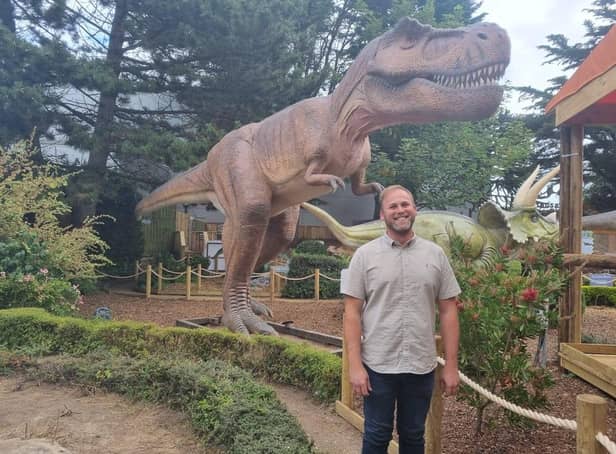 Charlton Cooper, director of Teen Spirit Ltd, in the new dinosaur experience at Skegness Aquarium.
