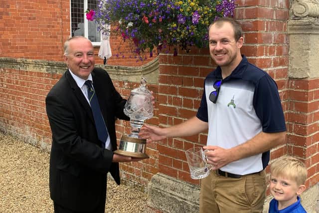 Captain Paul Marsden with Captain's Trophy winner Liam Jaines.