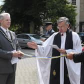 Rev Philip Johnson blessing the pennant that was awarded to the Sleaford and District branch of RBL, marking the 100 year anniversary. EMN-210908-091717001