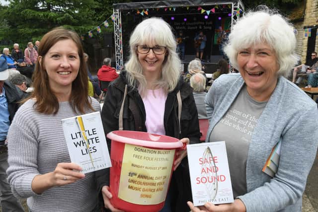 L-R Phillipa East - author, Anne Irving - co-organiser, Alison Fairchild - co-organiser at Leadenham Folk Festival. EMN-210908-093728001
