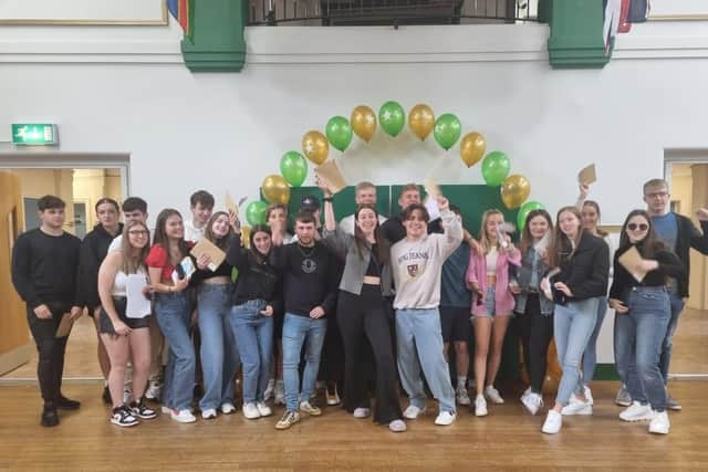 Skegness Grammar School sixth formers celebrating after receiving their A-Level results.