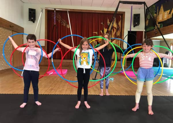 Circus skills workshops ongoing at Leadenham Village Hall with Circus Starlight. EMN-210813-162707001