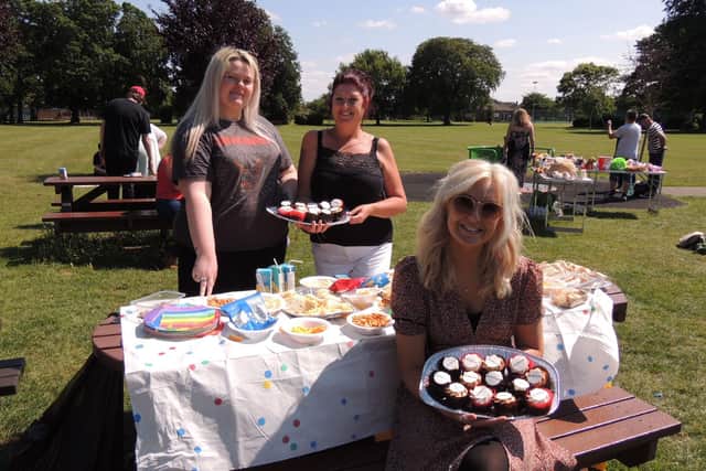 Serving up a good spread for charity at the family picnic on Boston Road park. From left - Rebecca Smith - bureau analyst for Utility Aid, Jane Peck of Rainbow Stars and Sasha Oliver - customer care and communications manager for Utility Aid. EMN-210813-112334001