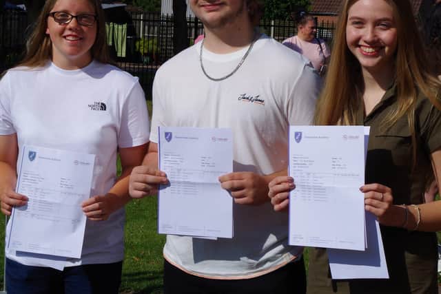 Charlotte Wright, Taylor Hewson and Amy Baxter-Rowson celebrate their GCSE results at Somercotes Academy today.