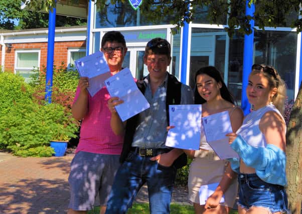 Oscar Wilson, Evan Roberts, Harriet Gilliatt and Grace Power  receive their GCSE results at Somercotes Academy today. The students have all been together since Grainthorpe Primary School.