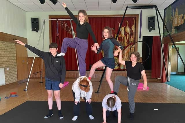 Circus skills workshops ongoing at leadenham with Circus Starlight. EMN-210813-162647001