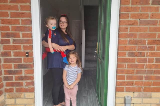 Hollie with Regan-James, 18 months, and Cassidy-Mai, aged three, have finally moved into their new home in Skegness.