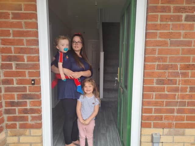 Hollie with Regan-James, 18 months, and Cassidy-Mai, aged three, have finally moved into their new home in Skegness.