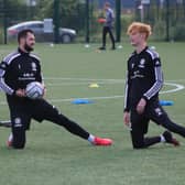 Peter Crook (left) with fellow stopper Jake Frestle. Photo: Oliver Atkin