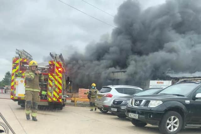 Emergency services at the scene of a blaze at a warehouse in Wrangle.