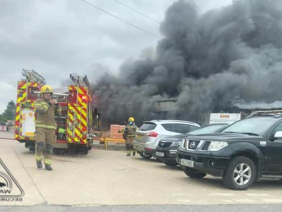 Emergency services at the scene of a blaze at a warehouse in Wrangle.