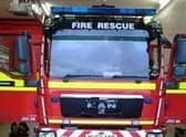 In an emergency dial 999 and ask for the fire service.