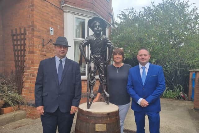 A new statue has been unveiled outside the Derbyshire Children's Holiday Centre in Skegness after the original one was stolen. Pictured are Coun Richard Cunnington, Ali Byerley, centre manager, and Coun Mark Dannatt.