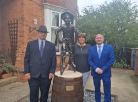 A new statue has been unveiled outside the Derbyshire Children's Holiday Centre in Skegness after the original one was stolen. Pictured are Coun Richard Cunnington, Ali Byerley, centre manager, and Coun Mark Dannatt.