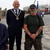 Veteran Leonard Browett (right)   was greeted by Paul Dixon, chairman of the Skegness branch of the Royal British Legion and Mayor of Skegness Coun Trevor Burnham after his 100-mile charity walk to Skegness.