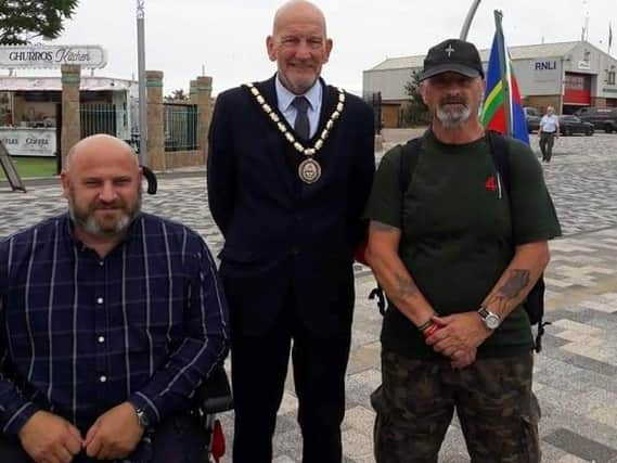 Veteran Leonard Browett (right)   was greeted by Paul Dixon, chairman of the Skegness branch of the Royal British Legion and Mayor of Skegness Coun Trevor Burnham after his 100-mile charity walk to Skegness.