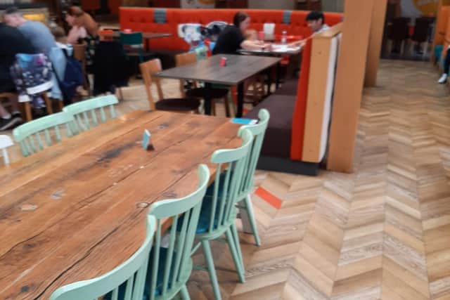 A restaurant full of empty tables when the Lomas' were turned away.