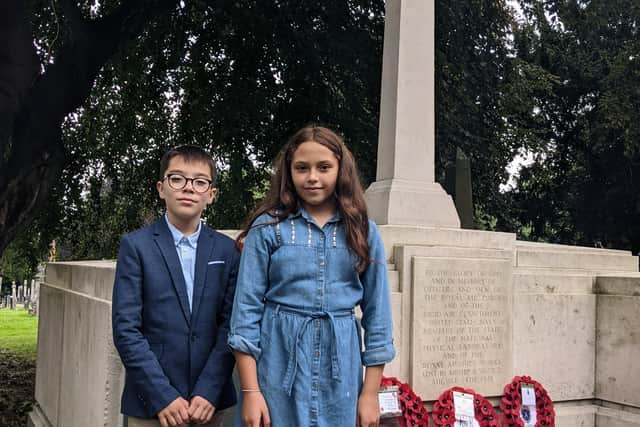 William Alvey School pupils David and Ithar at the airship memorial in Hull cemetery. EMN-210823-175628001