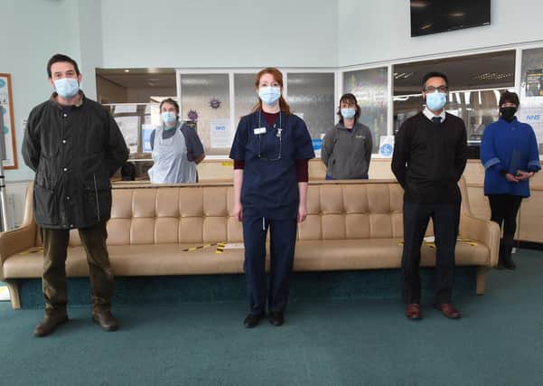 K2 Healthcare director Darren Altus (left) with the Covid vaccination team at Ruskington GP surgery. EMN-210213-154106001