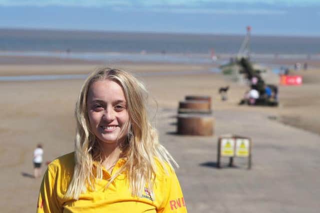 Louis rescued two small children who were going under the water in between the flags.