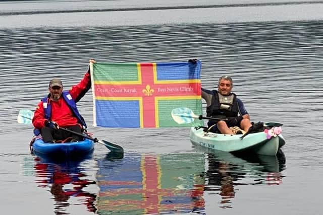 Celebrating completing their journey at Inverness. From left - Mark Hennis and Sunny Sardesai. EMN-210830-192949001
