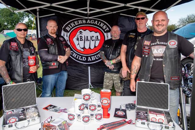 BACA members on the Bikers Against Child Abuse stand. EMN-210830-114517001