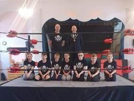 Mayor of Skegness Coun Trevor Burnham has paid a visit to the LWP Wrestling Academy School.
