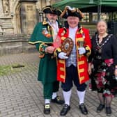 The winner of Sleaford Town Crier contest 2021 - Michael Wabe of Watton, with Sleaford crier John Griffiths and Coun Linda Edwards-Shea - Deputy Mayor. EMN-210609-183140001