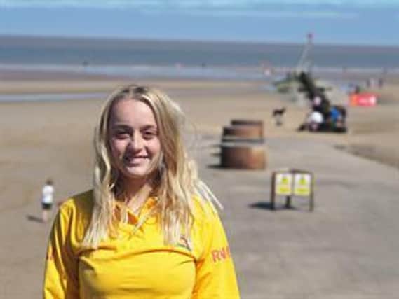 RNLI Lifeguard Lois Kemp was patrolling the swim zone when she noticed the two children between the red and yellow flags.