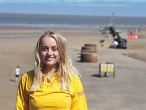 RNLI Lifeguard Lois Kemp was patrolling the swim zone when she noticed the two children between the red and yellow flags.