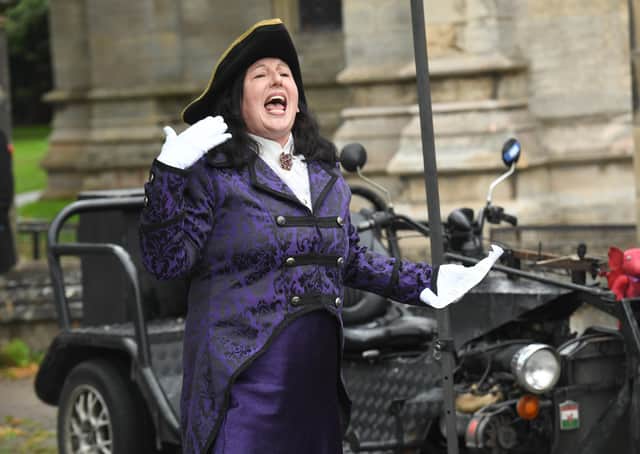 One of the three female town criers taking part this year. EMN-210609-121236001