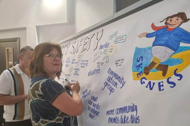 The writing on the tablecloths at Jolly's World Cafe in Skegness is transferred onto the board.