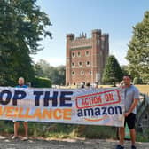 Action against Amazon protest at Tattershall Castle, form left: Sam Luczynski, Shawn Betts and Bogdan Idasiak. EMN-210809-140257001