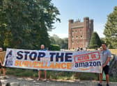 Action against Amazon protest at Tattershall Castle, form left: Sam Luczynski, Shawn Betts and Bogdan Idasiak. EMN-210809-140257001