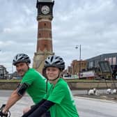 Sophie Bastow and dad at the Skegness clock tower. EMN-210913-113703001