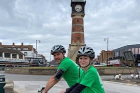Sophie Bastow and dad at the Skegness clock tower. EMN-210913-113703001