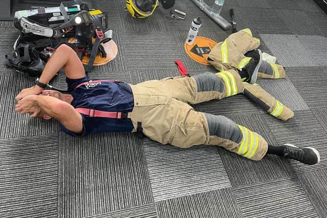 Simon Coxell completes the challenge in memory of the firefighters who died in 9/11.