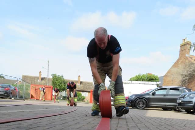 Roll up, roll up. Donations raised for LIVES and the Firefighters Charity. EMN-210913-125835001