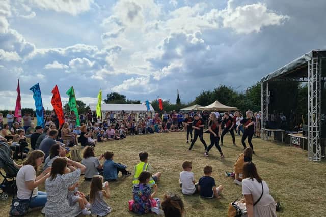 Dance routines by a local group for the Flag Fest fun. EMN-210913-181808001
