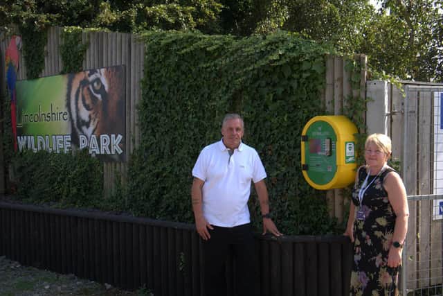 Steve with East Lindsey District Councillor Carleen Dickinson, who used her councillor's grant to buy a temperature controlled and lit cabinet for the life-saving equipment.