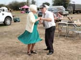 Dancing along to the 1940s beats. EMN-210916-115530001