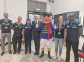 Mayor of Skegness Coun Trevor Burnham and the Jolly Fisherman greet the Flippin Pain team on their arrival at the Tower Gardens Pavilion in Skegness.