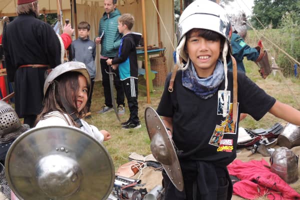 Juliet and Alex Rowles of Dowsby check out the medieval armour at Folkingham Heritage Festival. EMN-210920-133242001
