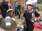Juliet and Alex Rowles of Dowsby check out the medieval armour at Folkingham Heritage Festival. EMN-210920-133242001